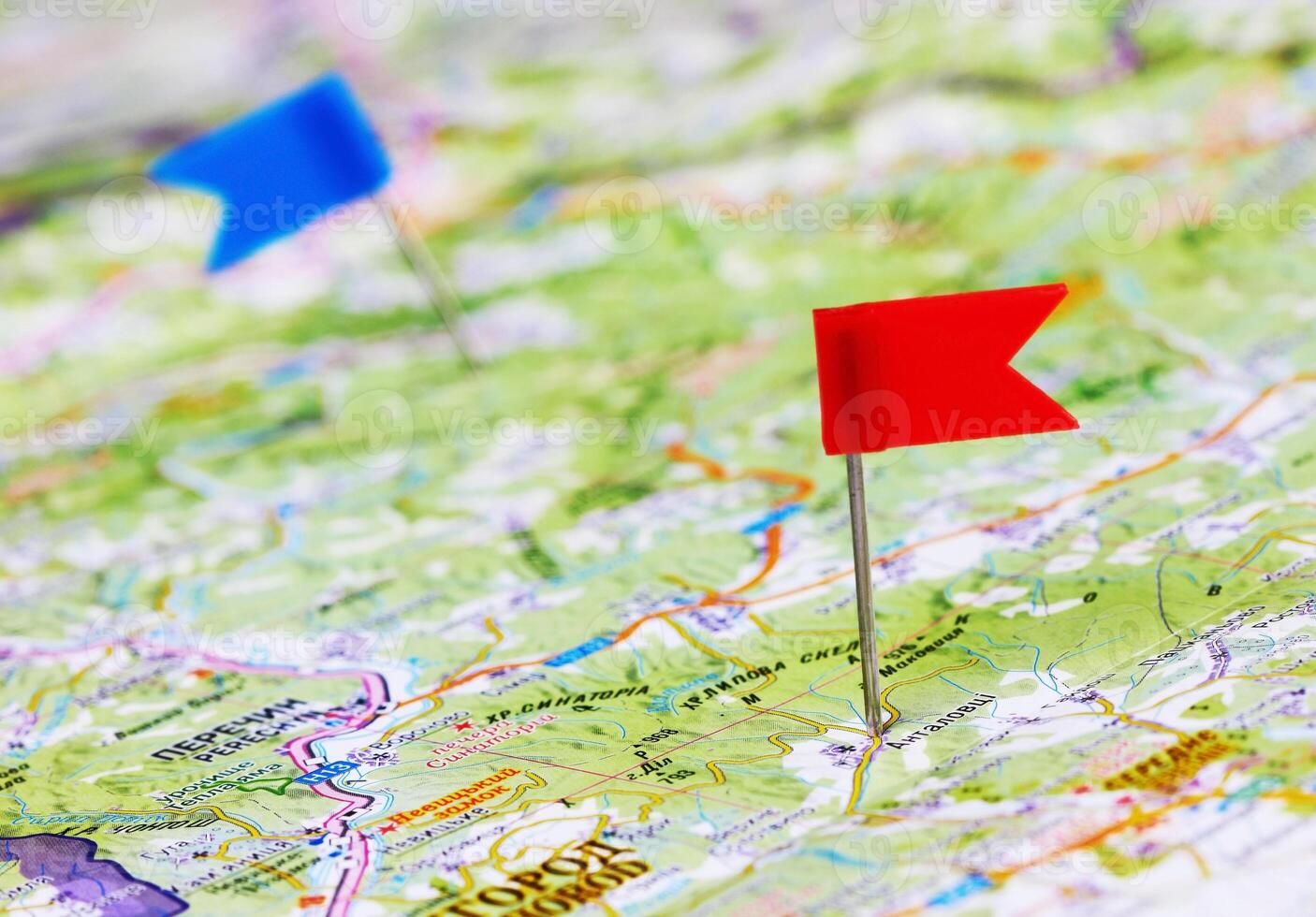Push pin in map photo