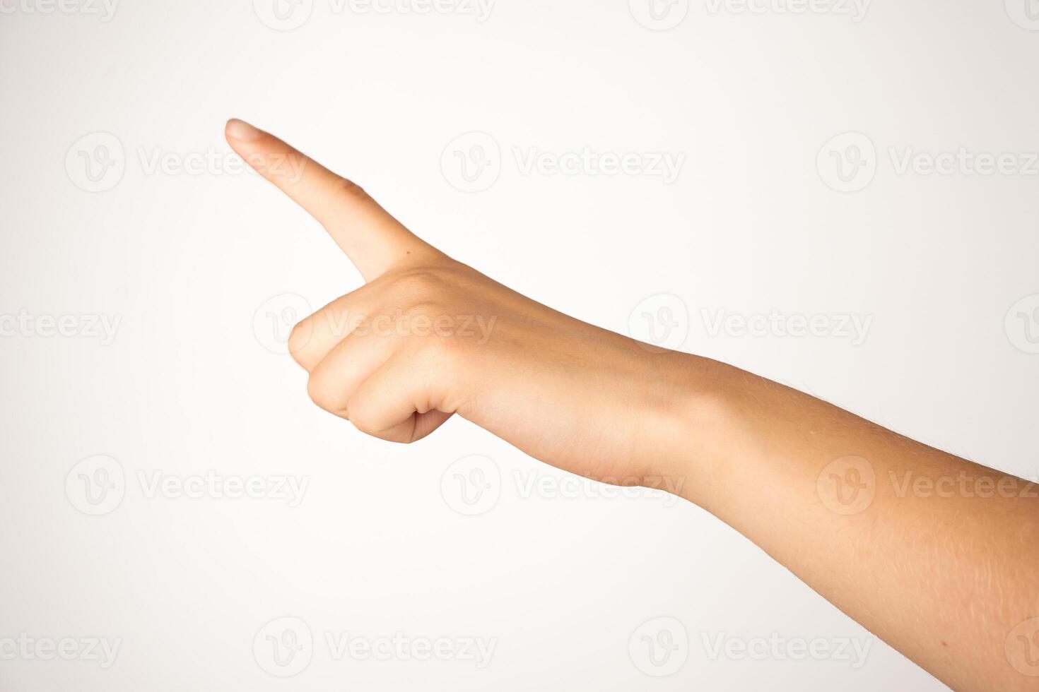 A human hand with extended index finger is isolated on a plain white background, showing a clear pointing gesture. Suitable for concepts involving direction, instruction, navigation, or user interface design. photo
