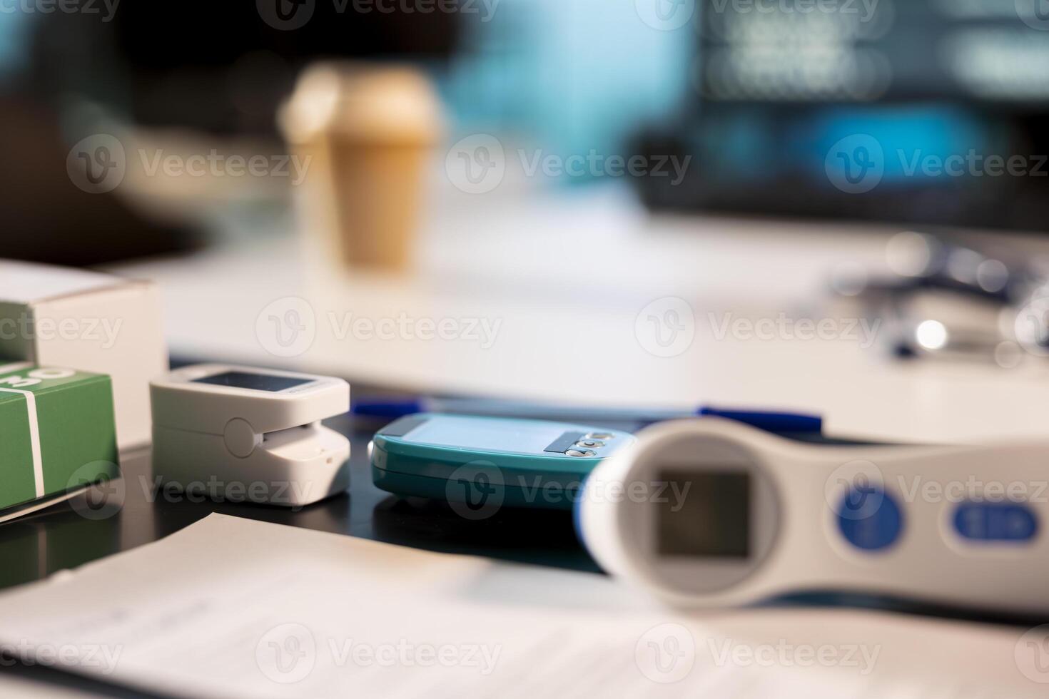 Empty medical office with modern consultation tools on the table, ready for check up appointments with patients. Cabinet at the facility used to provide advanced diagnostics, healthcare services. photo