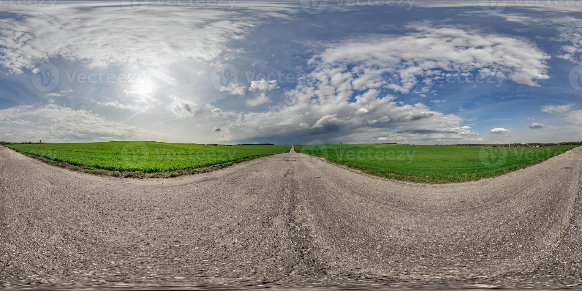 360 panorama of a road and grass field photo