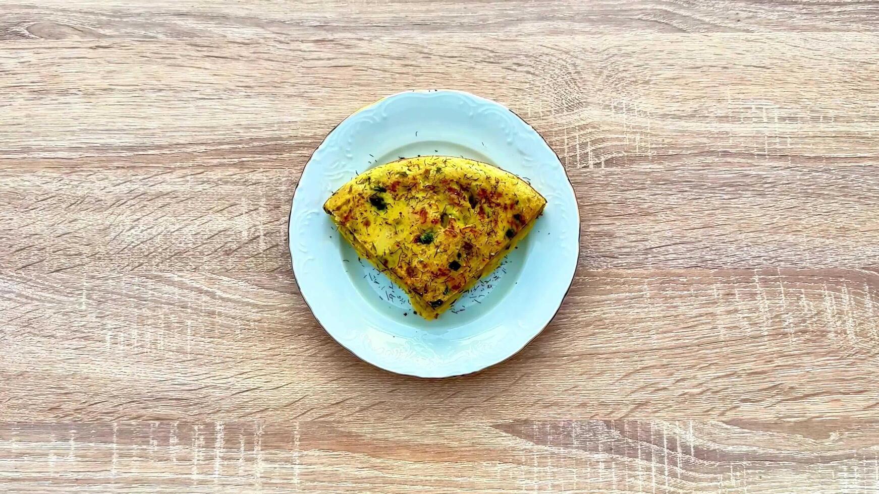A Deliciously Cooked Omelette, Perfectly Made with Fresh Herbs and Various Spices Added photo