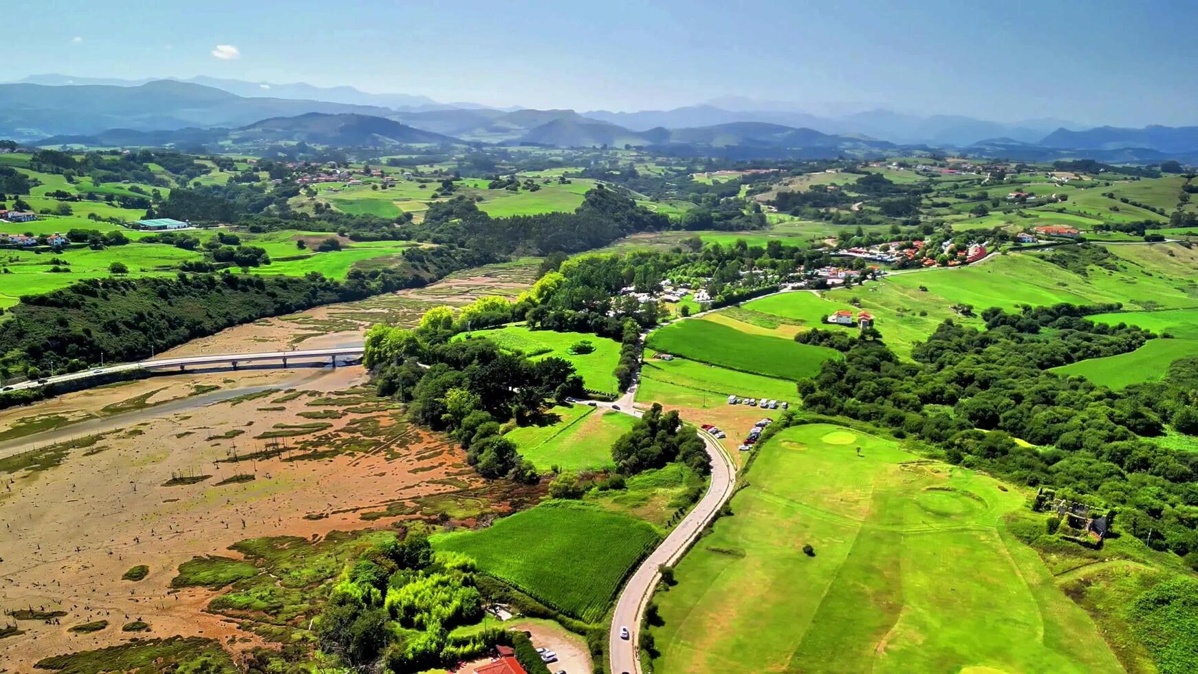 Stunning Scenic Aerial Views of Vibrant Green Landscapes and Pristine Beaches await you photo