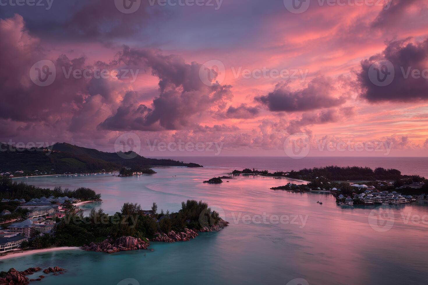 A beautiful sunset over the ocean and island photo