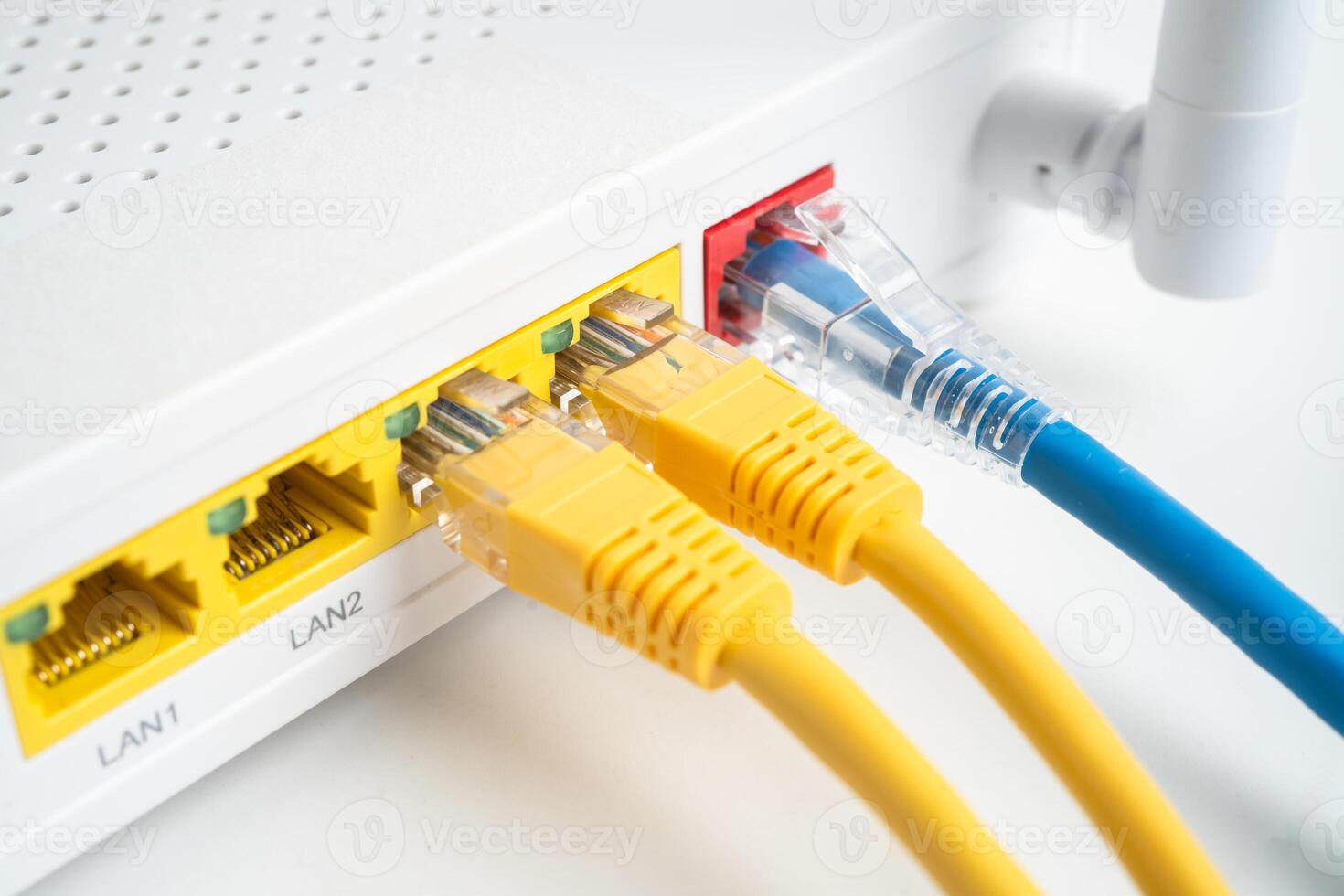Ethernet cable with wireless router connect to internet service provider network. photo