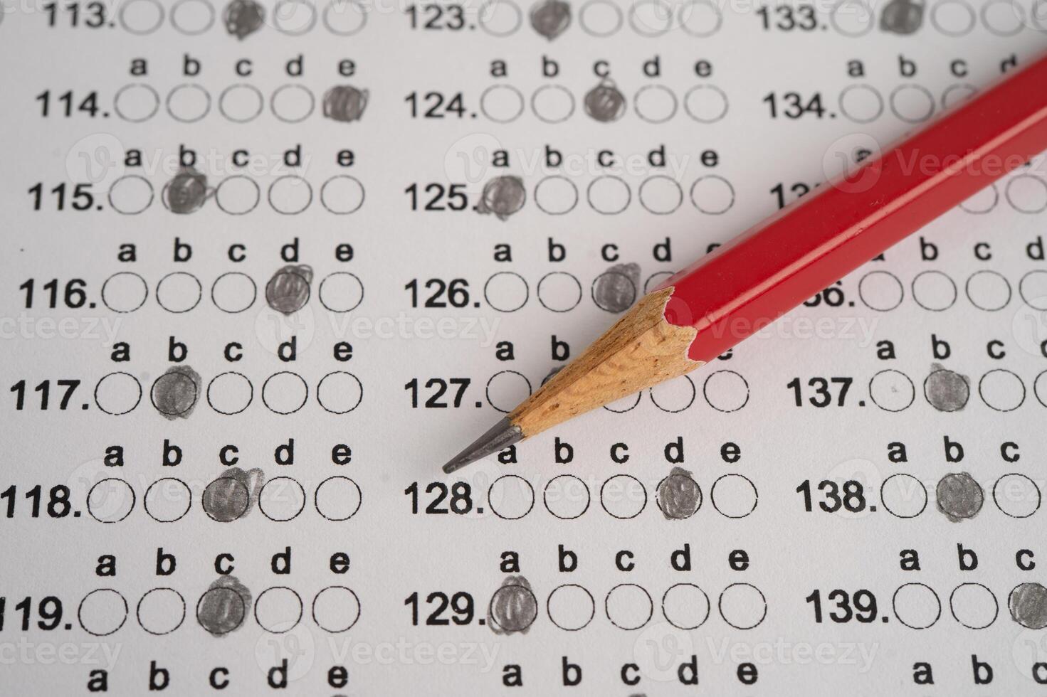 Answer sheets with pencil drawing fill to select choice, education. photo