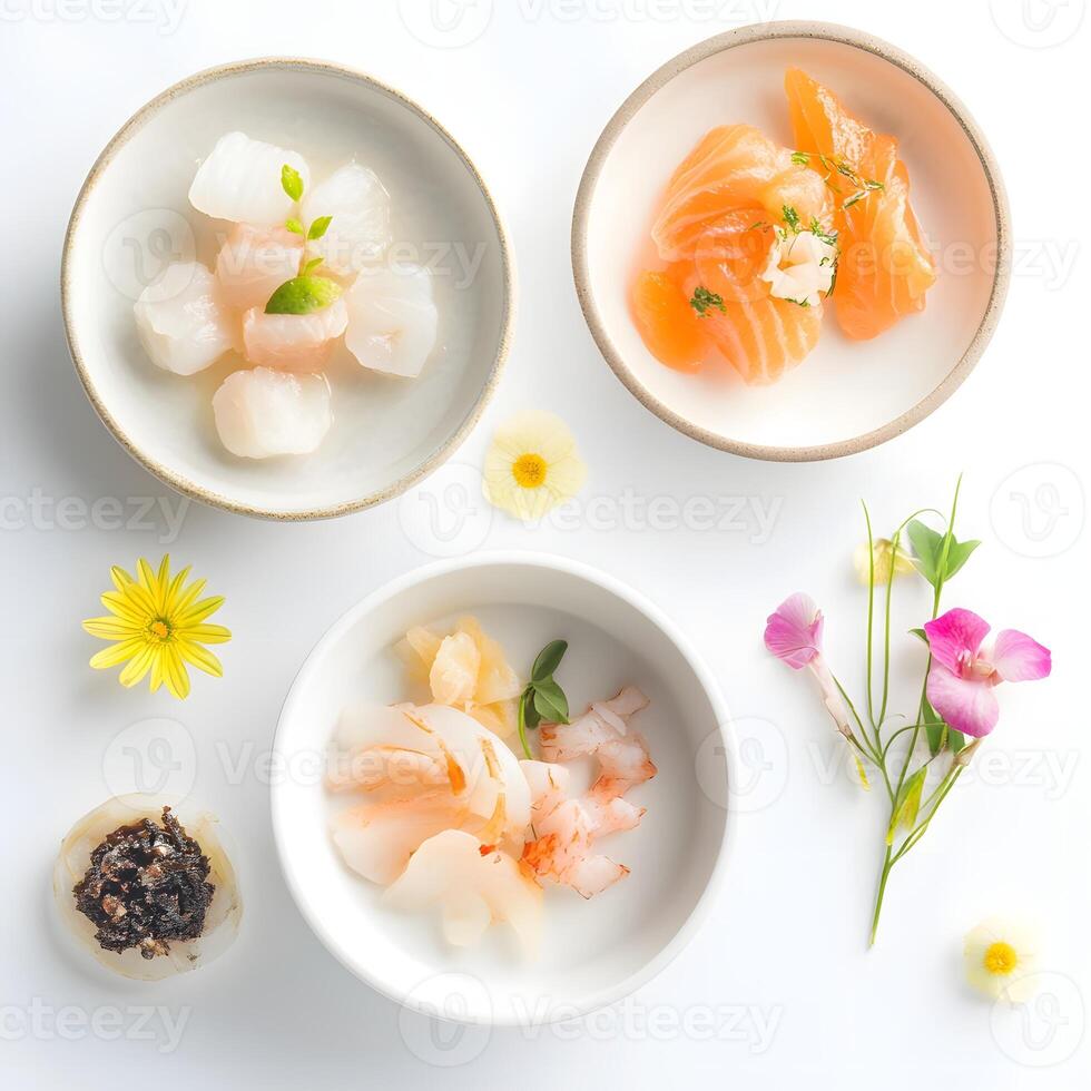 Sashimi in ceramic bowls on a white background, top view. Japanese Cuisine. photo