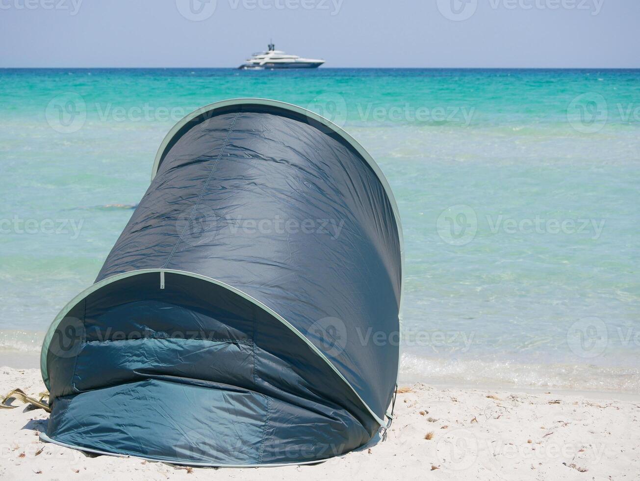 Sun protected tent at the beach Spiaggia La Cinta in San Teodoro, Olbia, Sardinia. photo