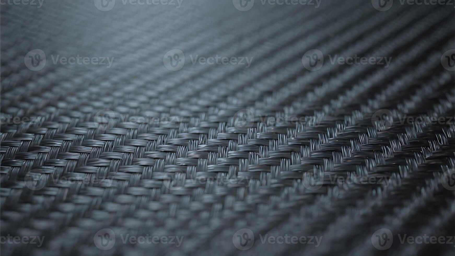 Abstract Dark Gray Carbon Fiber Weave Texture Background Close-up Detailed Macro Shot of Intertwined Fibers photo