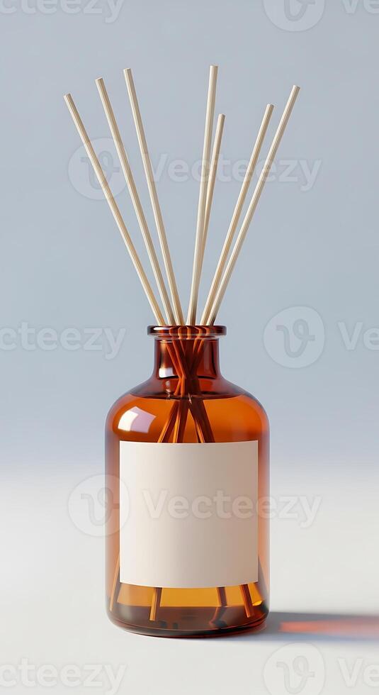 Amber glass bottle with reed diffuser sticks and blank label against a light background photo