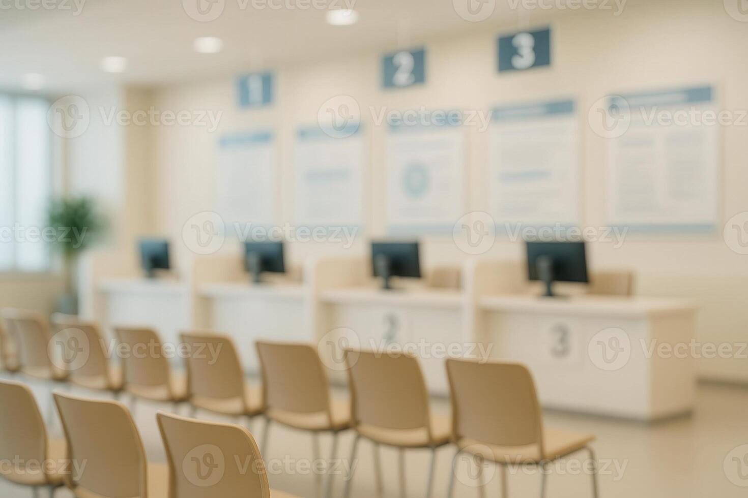 Government Office Waiting Area With Rows Of Chairs And Service Counters With Computers In A Bright Room photo
