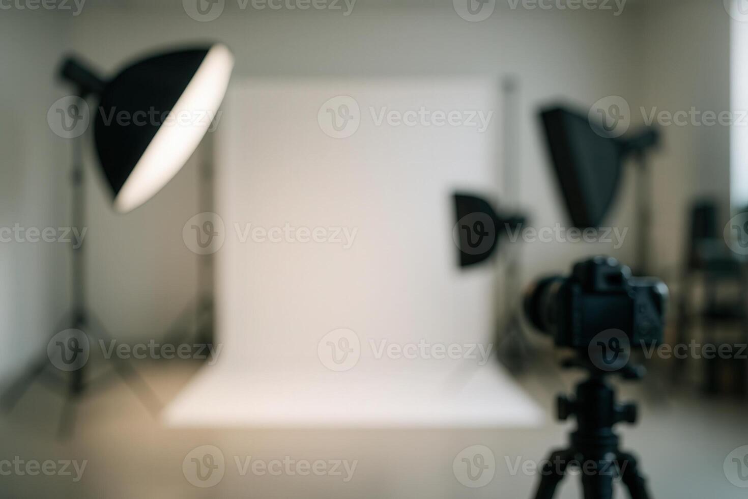 Photography Studio Setup with Softboxes, Backdrop Screens, and High End Camera Equipment in Blurred Background for Professional Photo Shoot
