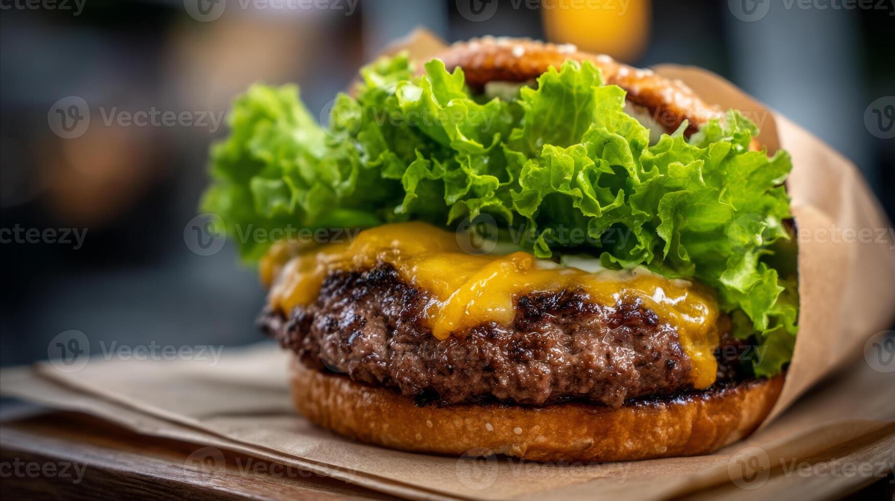 A delicious beef patty topped with gooey melted cheese is nestled in a fresh lettuce wrap, creating a satisfying keto fast food alternative. This meal offers a healthy twist on classic favorites. photo