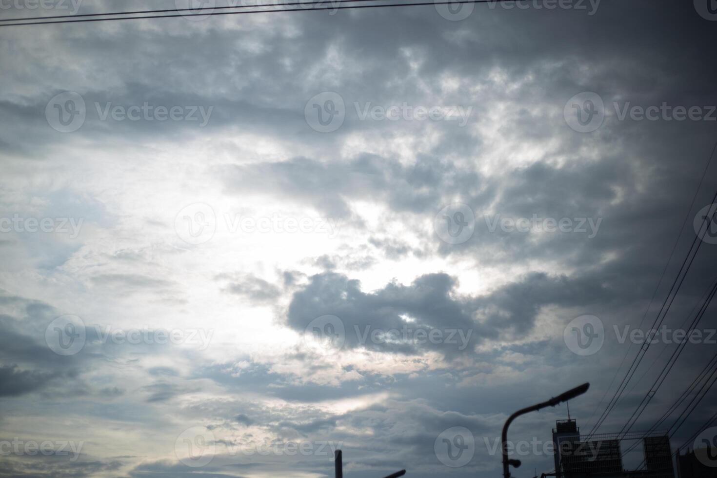 dark blue cloud with white light sky background and city light midnight on evening time photo