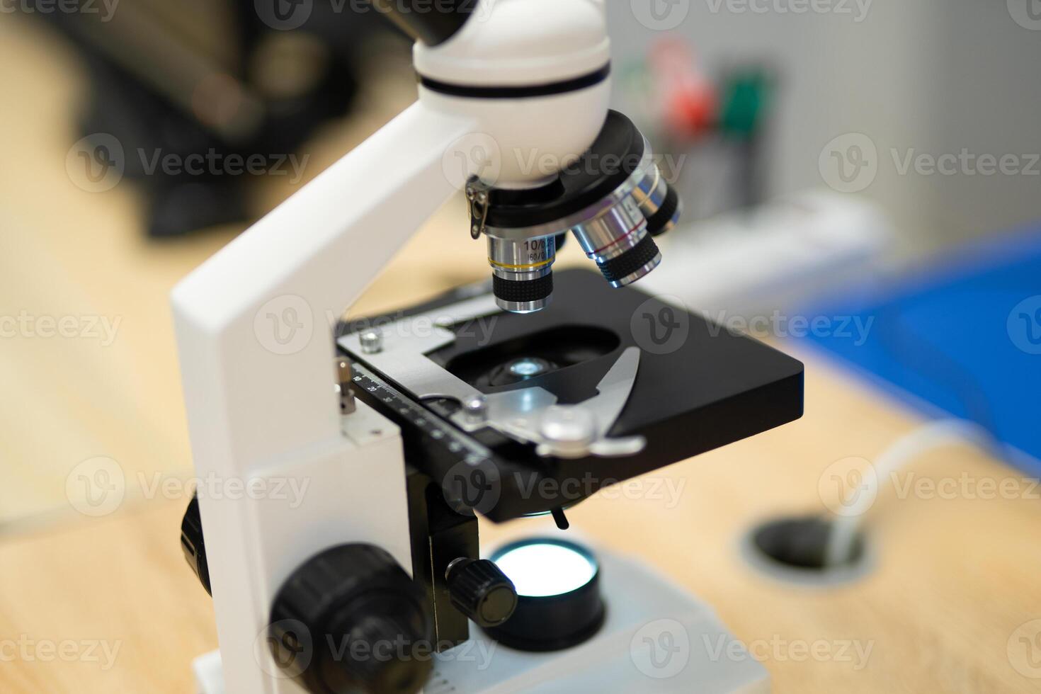 professional microscope in a school laboratory for the study of cells and bacteria- photo