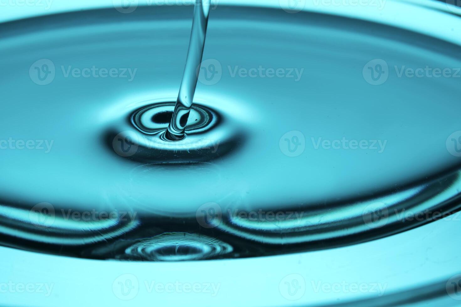A very beautiful drop with an oily texture in turquoise tones. photo
