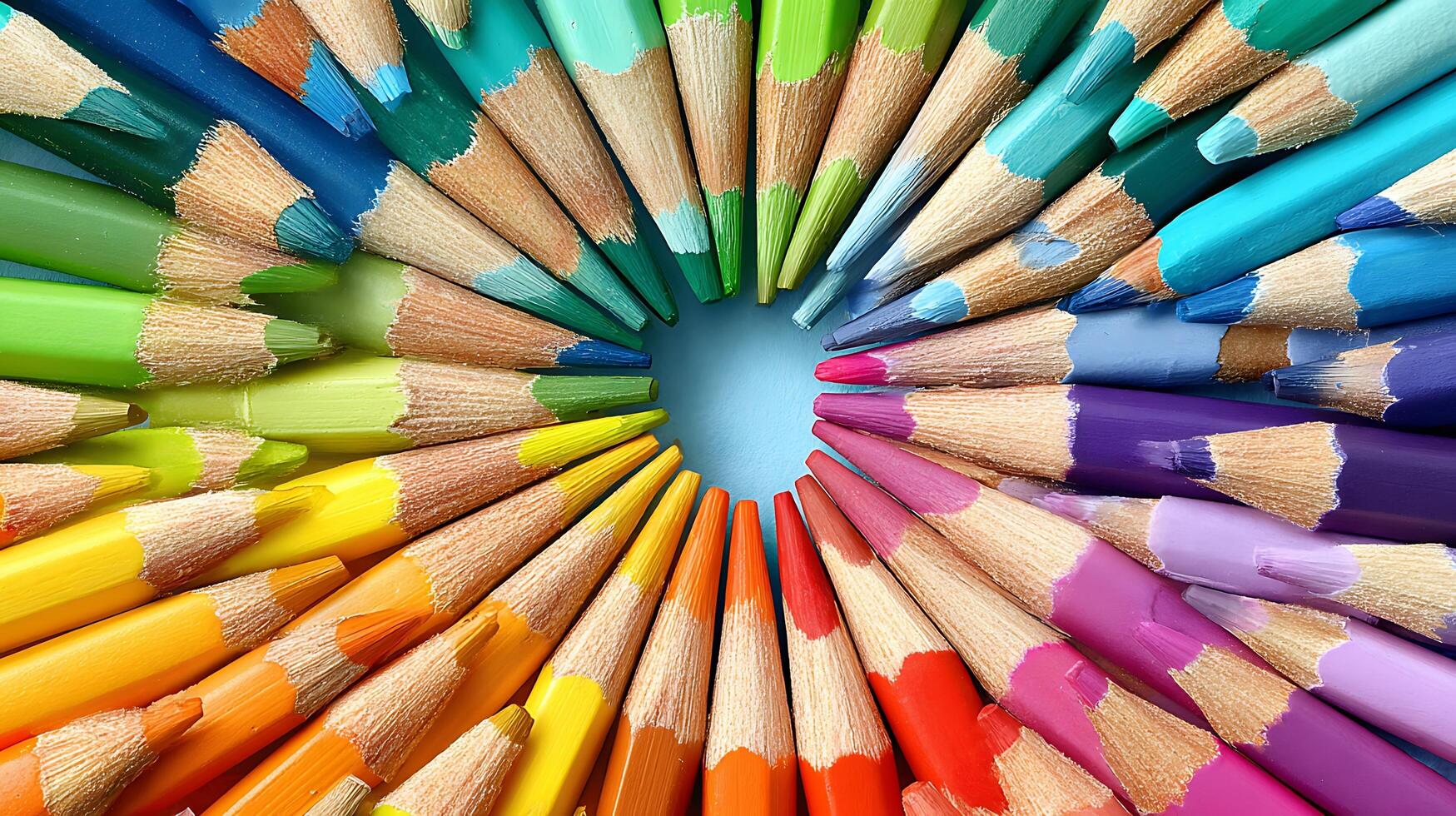 A Spectrum of Sharpened Colored Pencils Ready for Creativity. photo