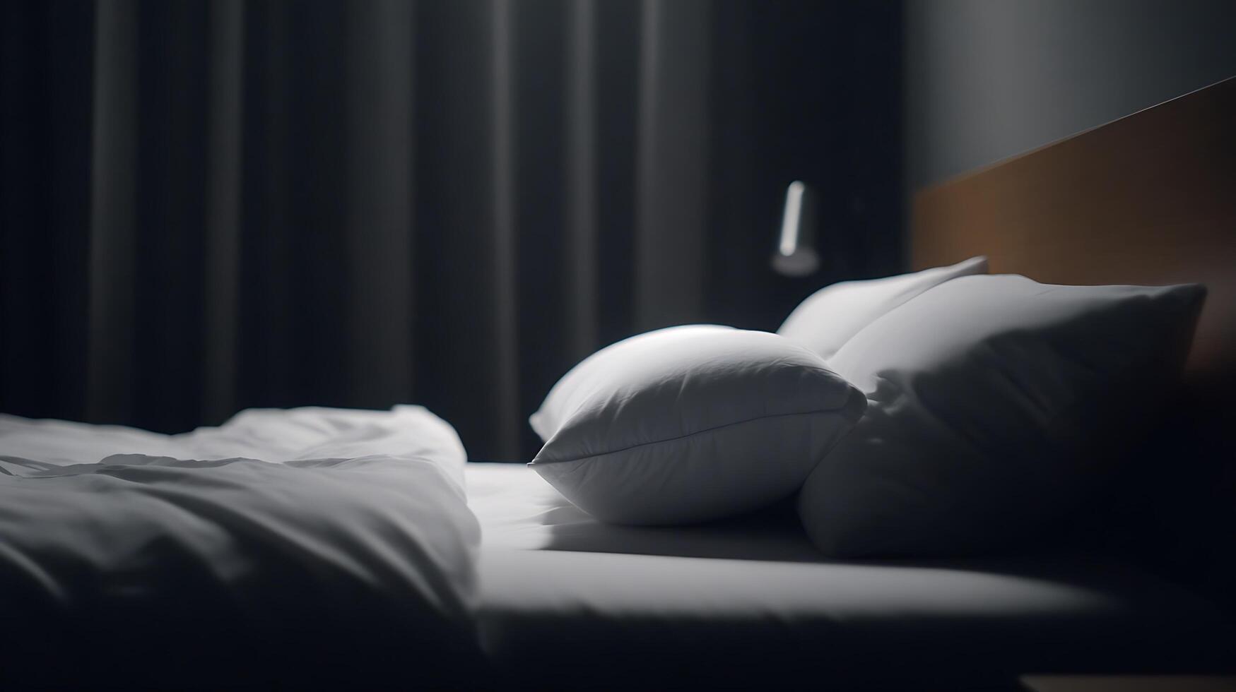 Cozy Hotel Bed with Soft Pillows and Clean Sheets in Dim Light. photo