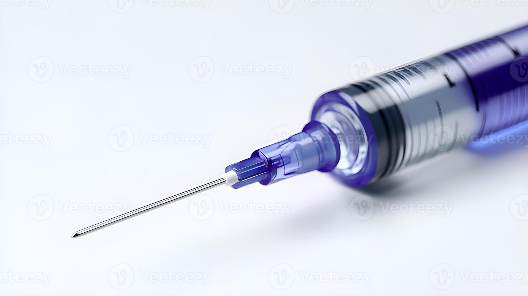 Medical syringe with needle pointing left on white background photo