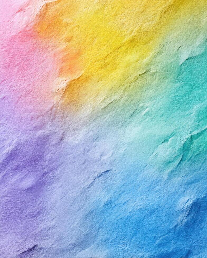 Soft textured paper with smooth gradient pastel colors blending from pink to yellow, green, blue, and purple, creating calm artistic background photo