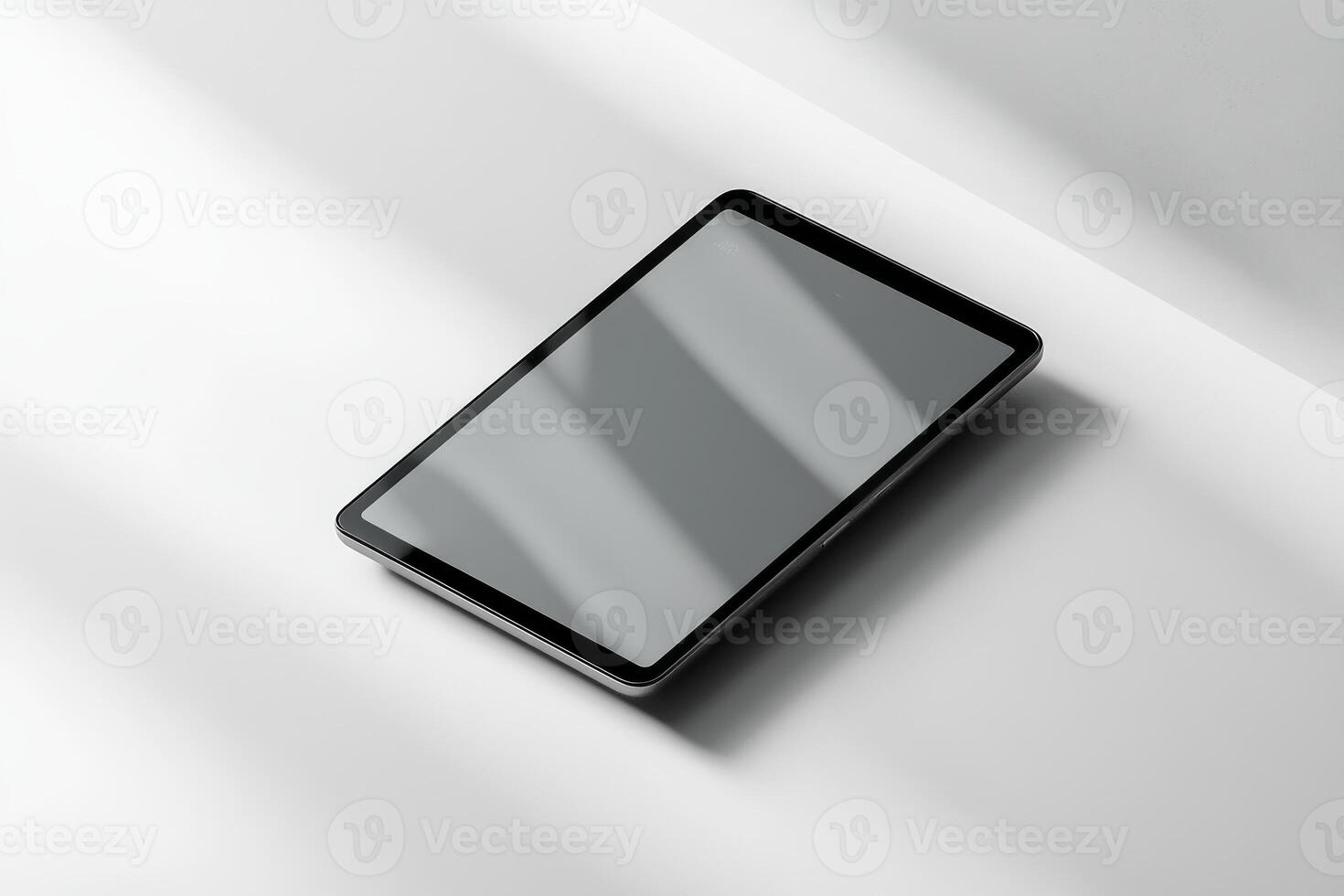 Minimalist Tablet on White Surface with Shadow Play and Subtle Lighting photo