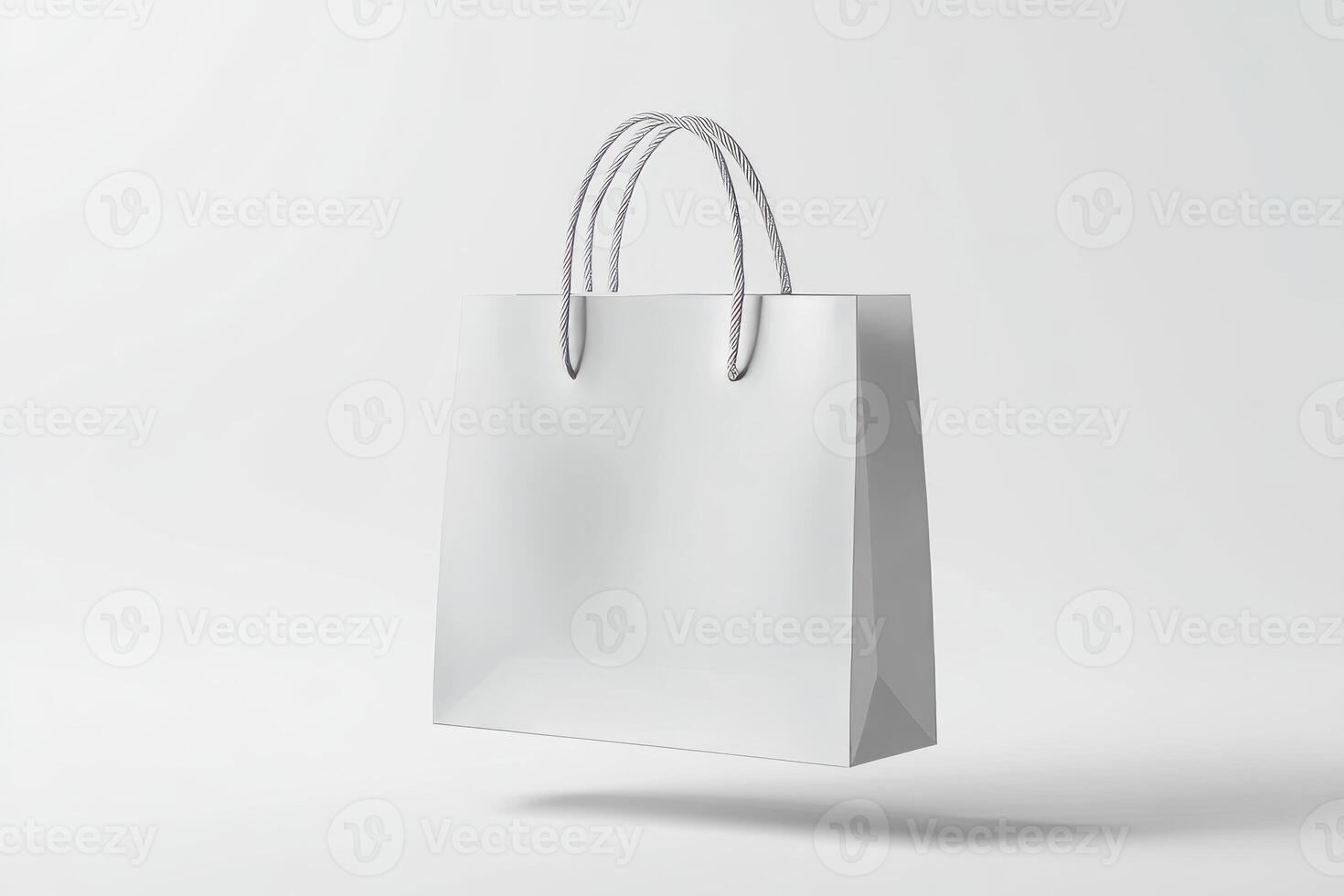 White Paper Shopping Bag with Twisted Handles on White Background photo