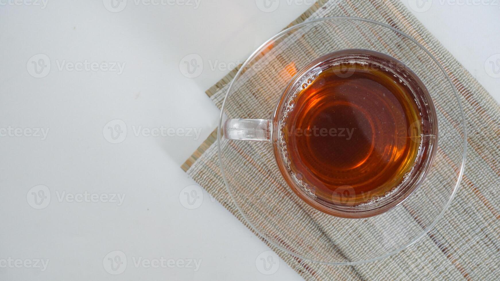 Top view of a cup of tea isolated on white background photo