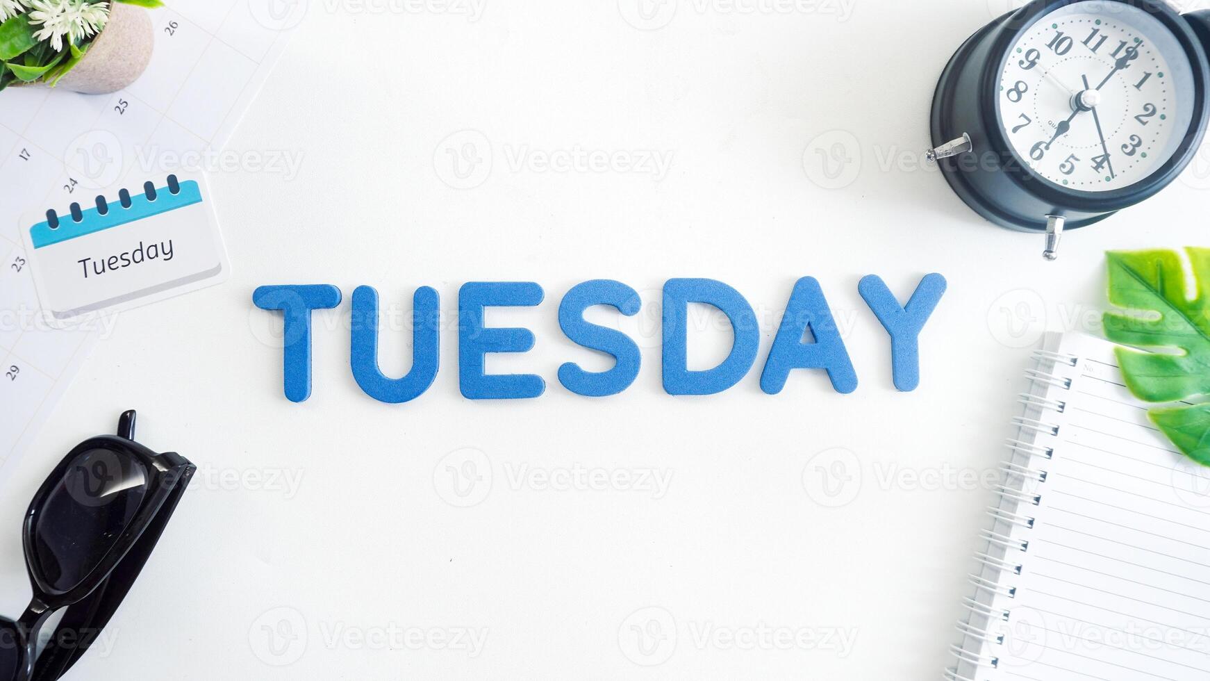Flat lay composition with blue color foam letters spelling word MONDAY isolated on white background photo