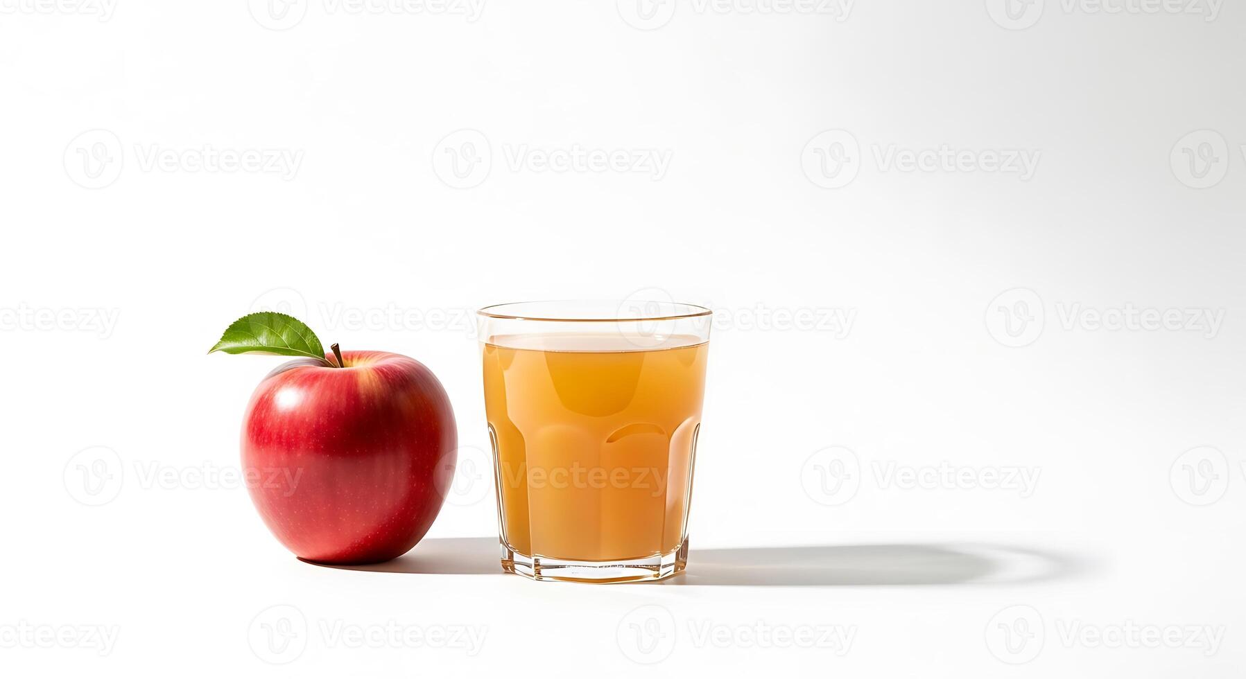 Fresh red apple and glass of apple juice on white background photo