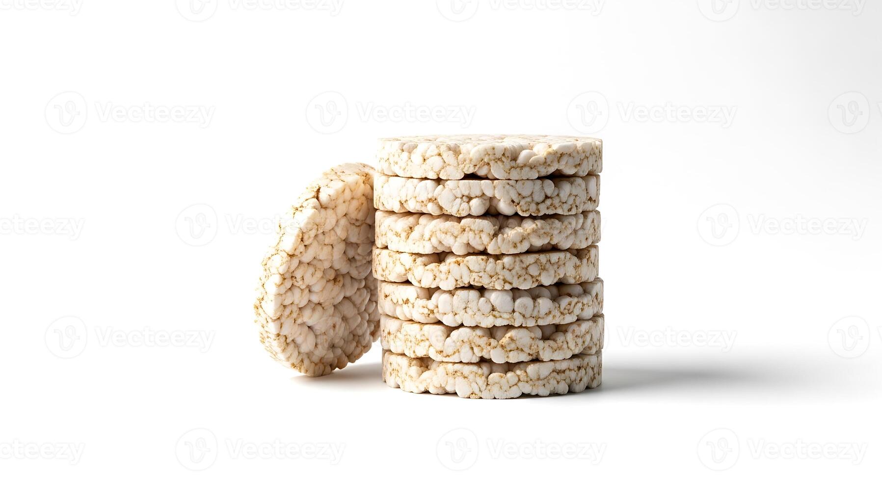 Stack of round rice cakes with one falling over photo