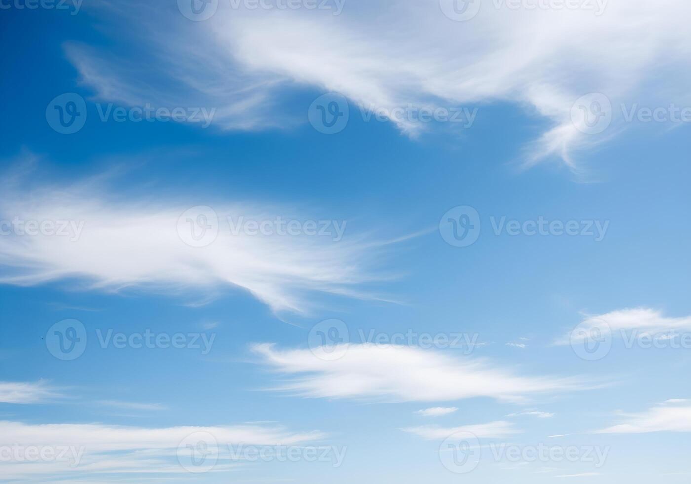 Blue Sky with Scattered Clouds in Natural Pattern photo