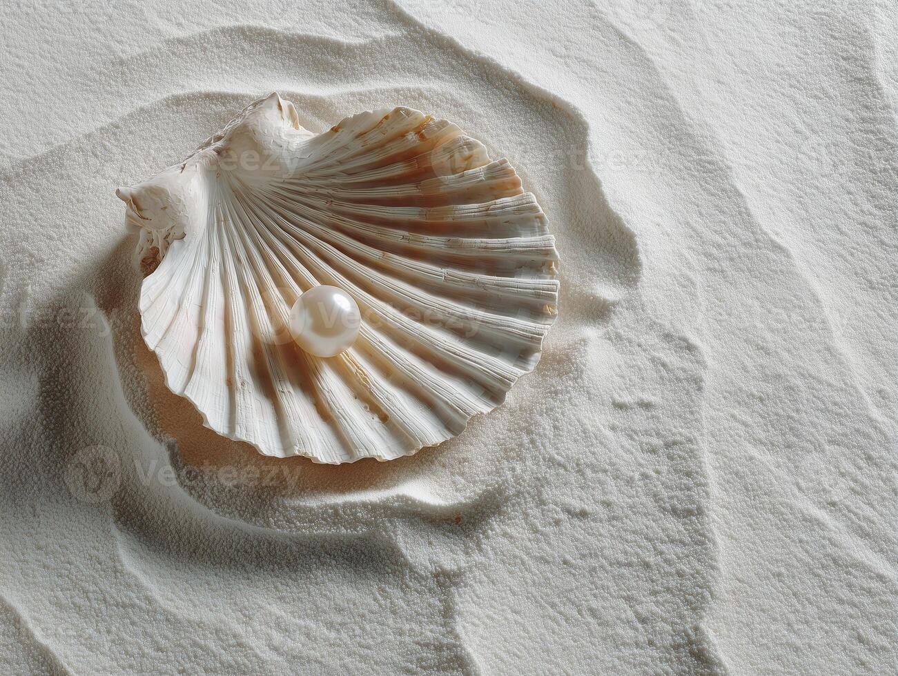Single delicate pearl resting softly in center of scallop shell, surrounded by fine sand, creates serene and elegant composition that evokes tranquility and beauty photo