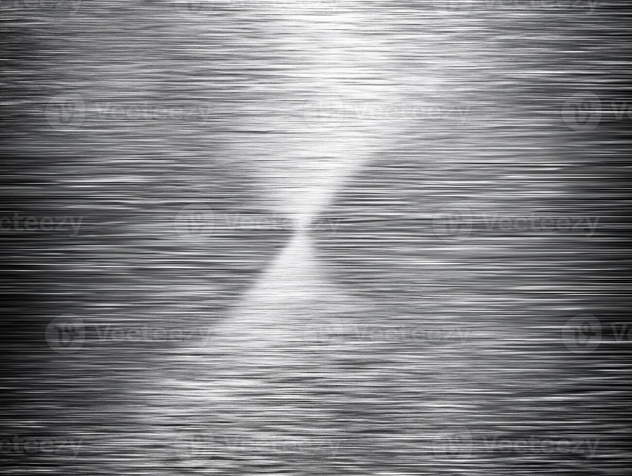 Smooth silver gray metal background features unique texture with subtle gradients and lines, creating abstract and artistic appearance that evokes sense of calm and sophistication photo