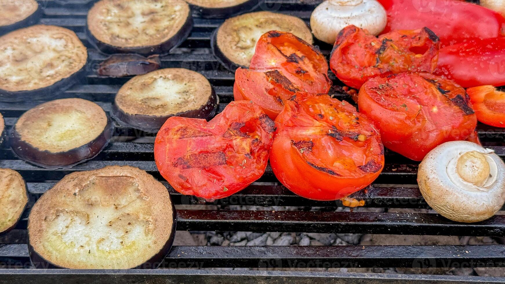 Smoky vegetables sizzle on a rustic grill, evoking Midsummer feasts and Diwalis vibrant celebration of flavors photo
