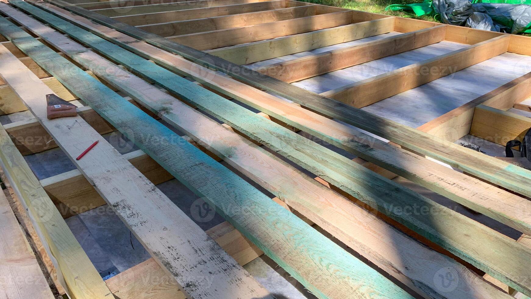 Sunlit planks cast geometric shadows, whispering tales of renewal and crafting dreams, resonant with Arbor Days silent promise photo