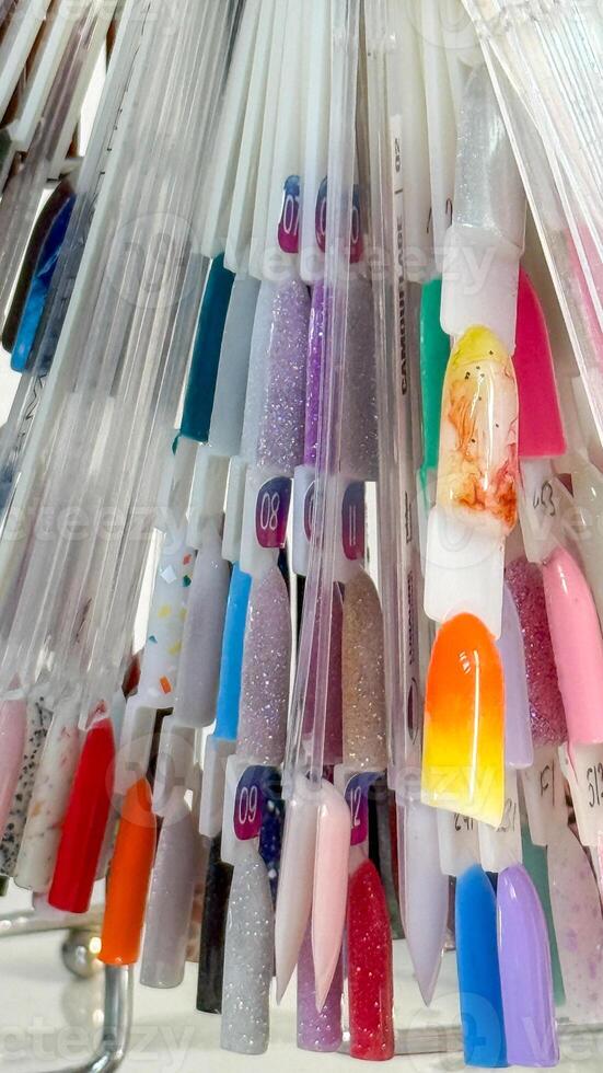 Kaleidoscope of nail art tips, vibrant chromatic cascade, invoking Holis riotous hues and Lunar New Year festivity, nail fashion bazaar photo