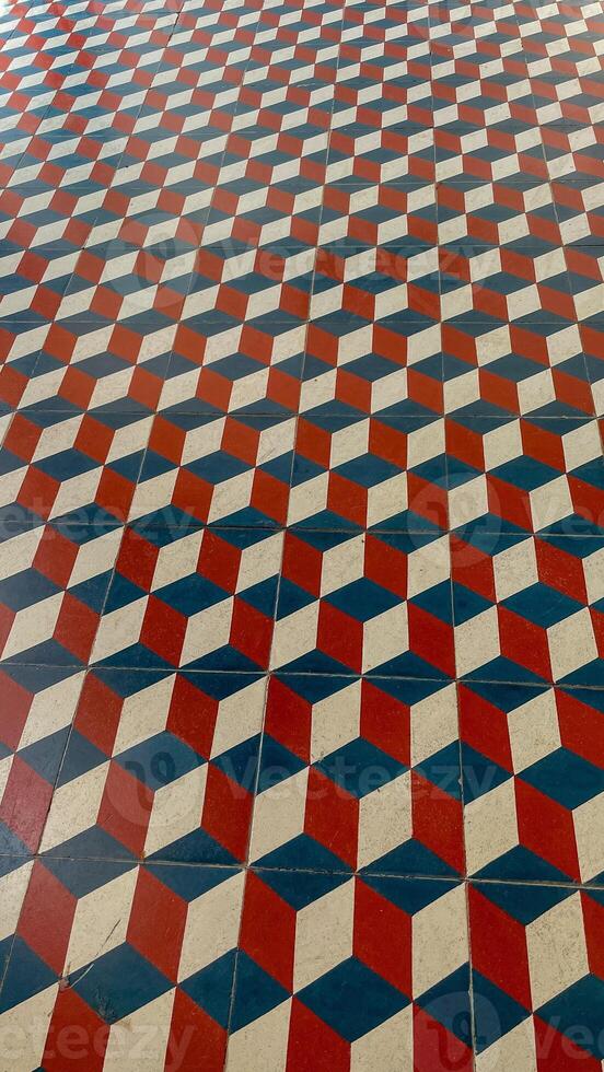 Mesmerizing geometric tile pattern echoes ancient labyrinthine mazes, invoking the festival of Diwalis vibrant decorations and Escher esque illusions photo