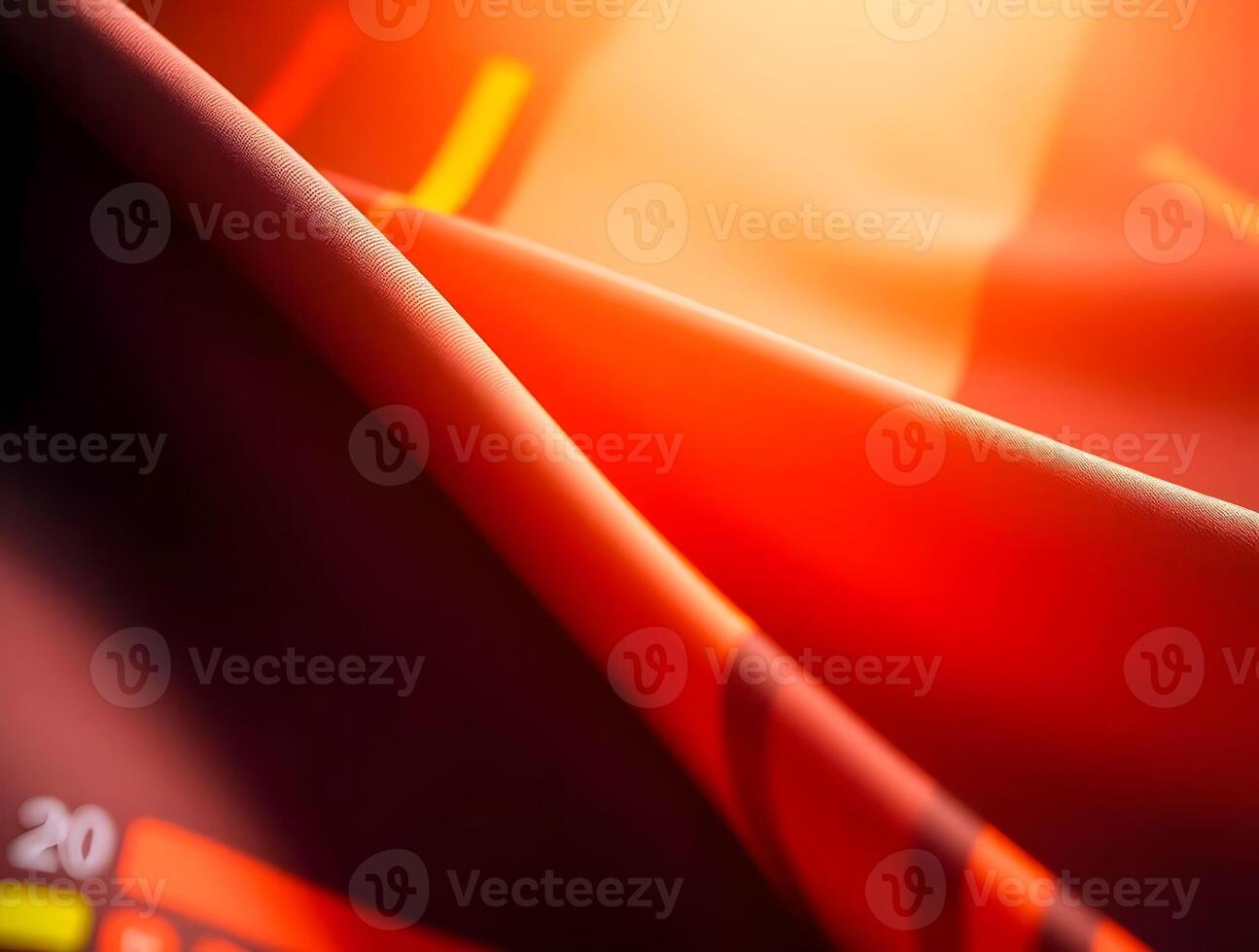 Fiery Abstract Texture Crimson Orange Fabric Drape with Subtle Yellow Highlights photo