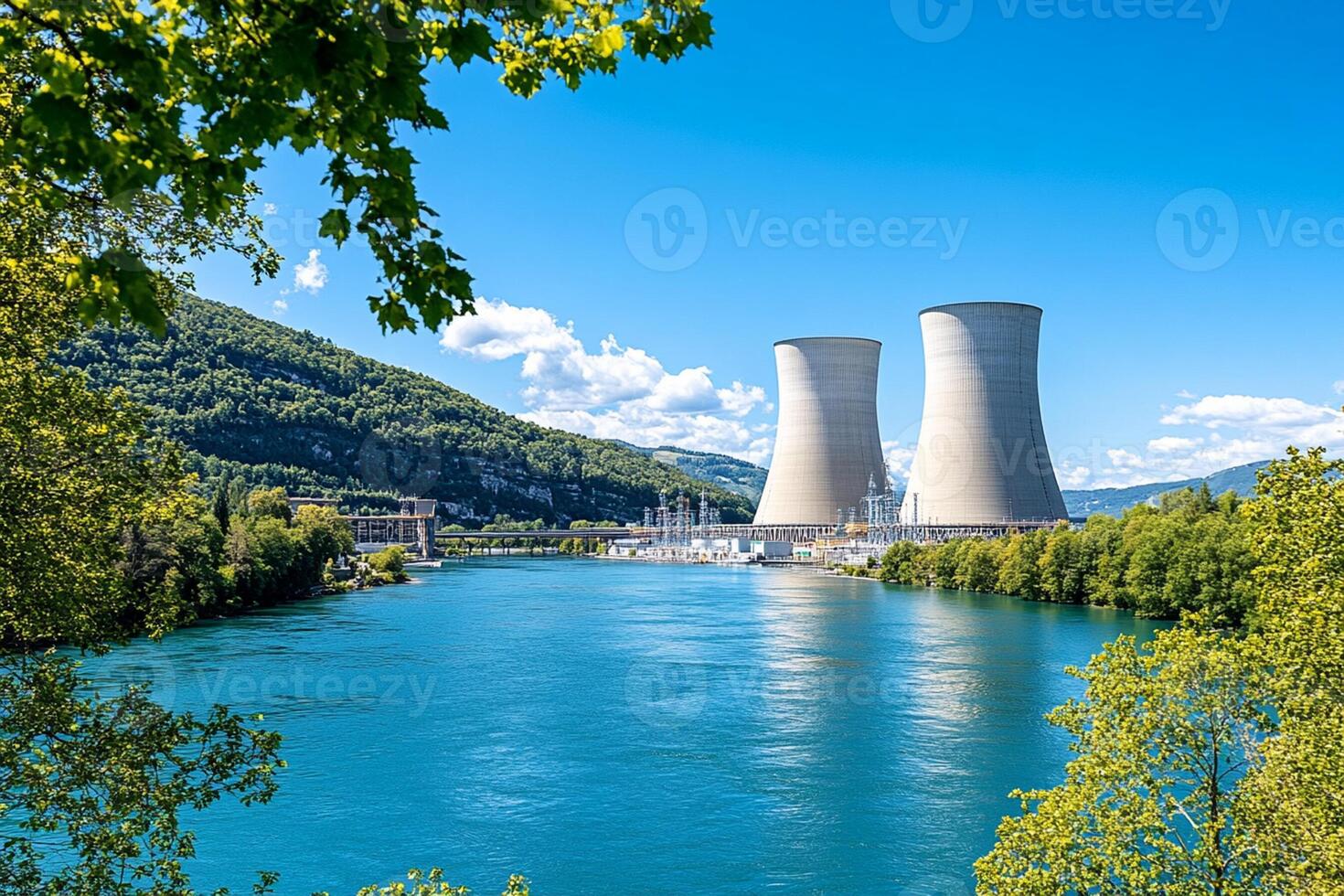 A river with trees and a power plant photo