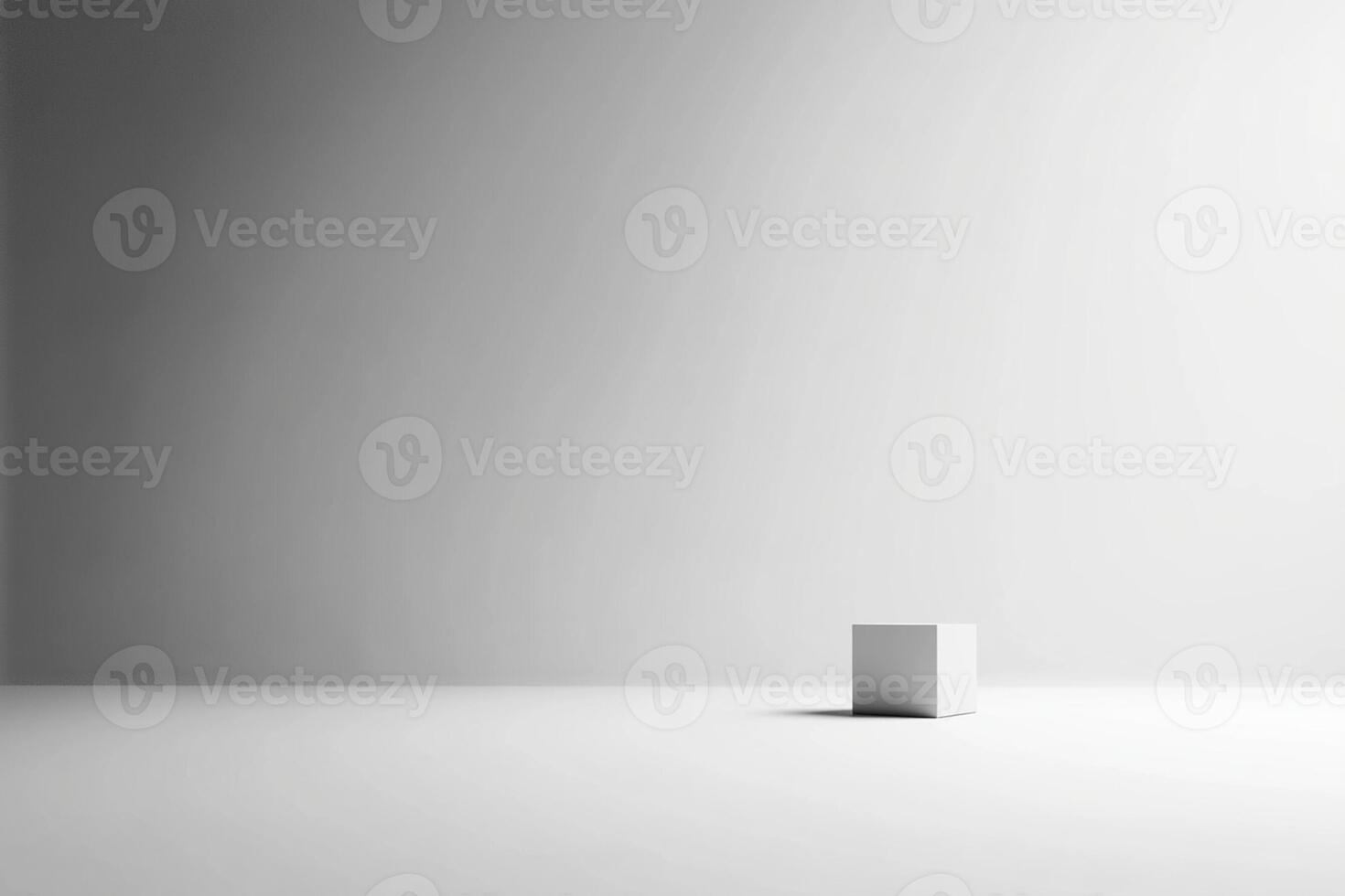 White cube in empty room with light photo