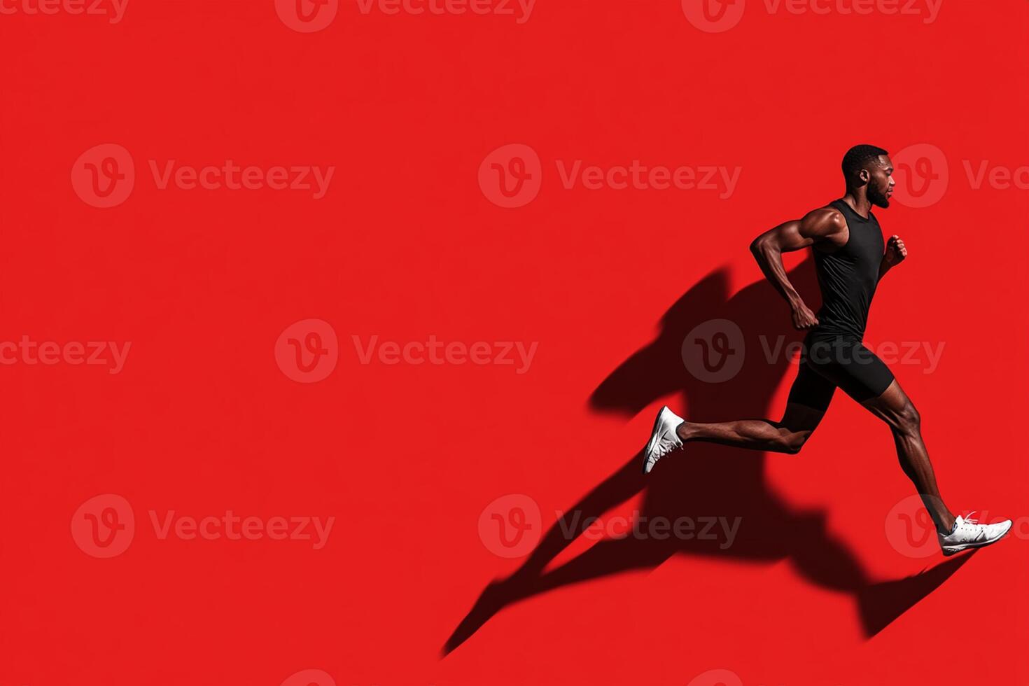 A man running on a red background photo