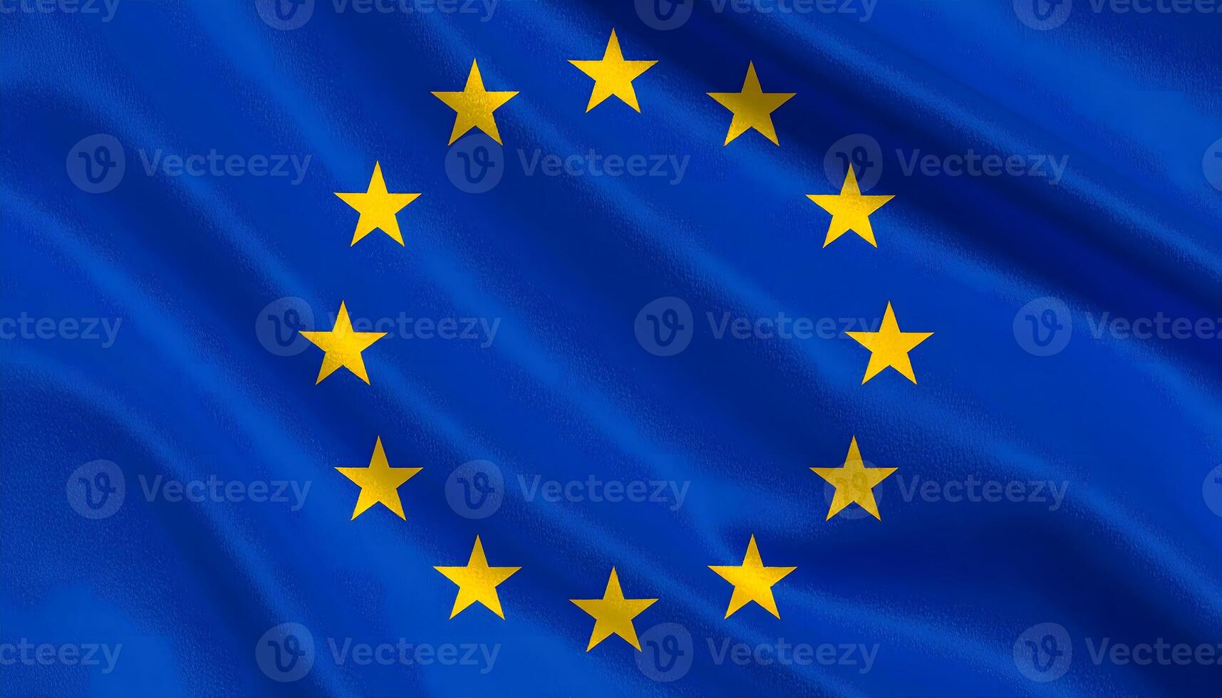 Close up of the waving flag of the European Union EU. A circle of twelve golden stars on a blue background. Symbol of European unity, politics, and international relations photo