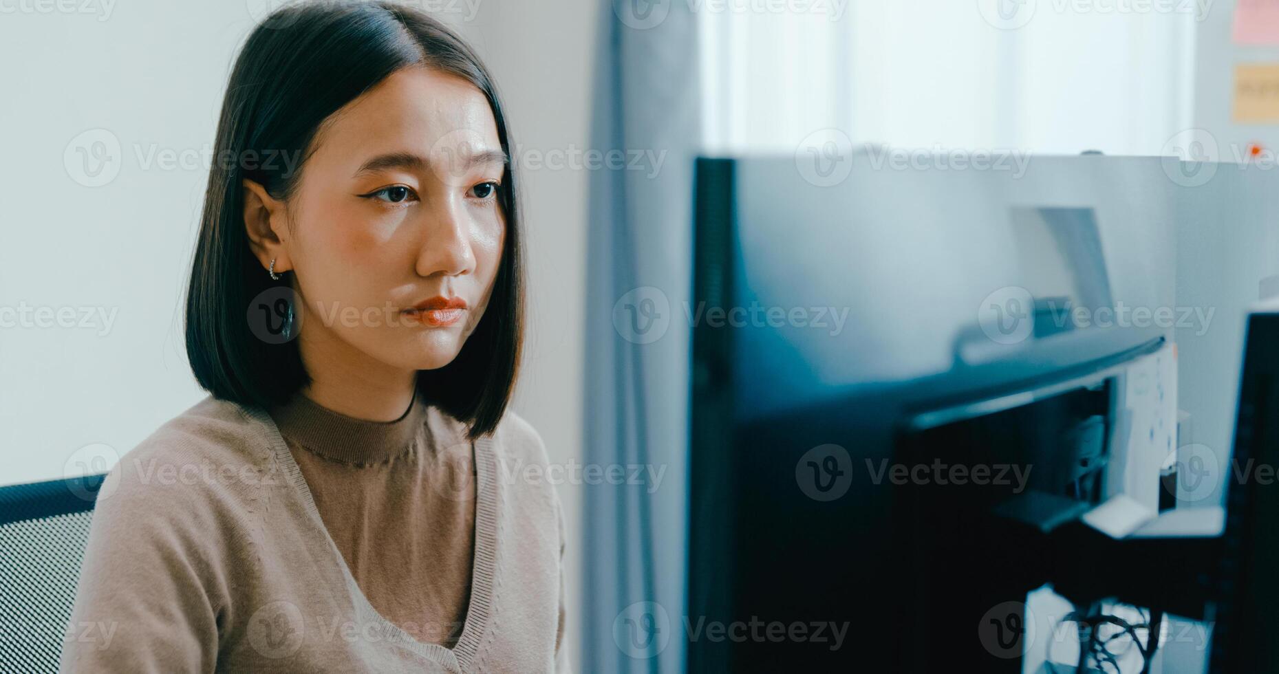 Young Asia female freelance typing write prompt AI bot IT app smart program nomad, game, terminal with coding language, user interface, designer, big data center on desktop computer. photo