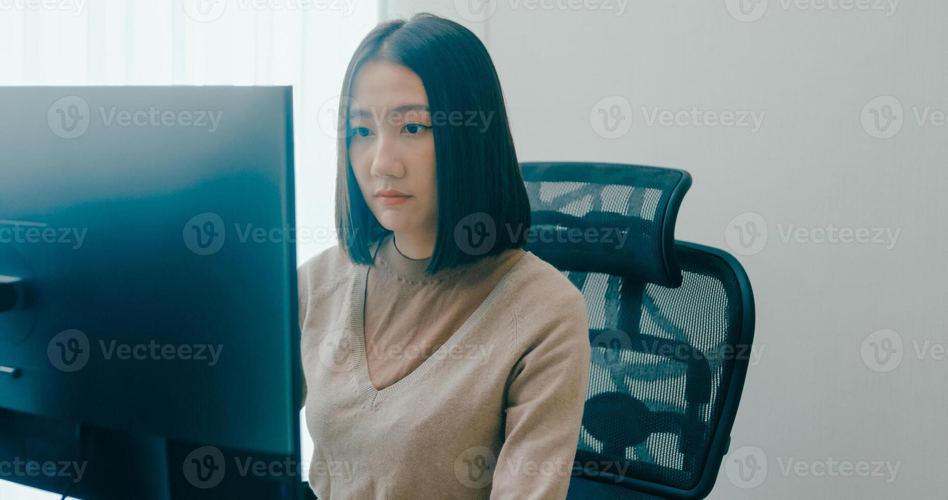 Young adult Asia female typing write prompt AI bot IT app smart program nomad, game, terminal with coding language, user interface, designer, big data center on desktop computer. photo