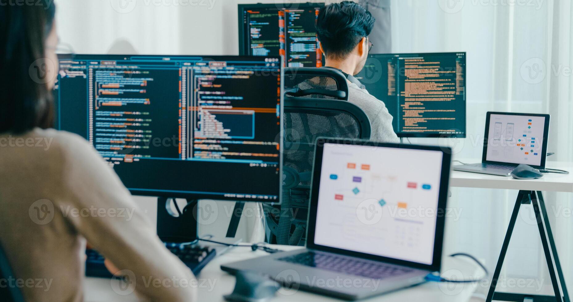 Closeup Asia male, female freelance typing write prompt AI bot IT app smart program nomad, game, terminal with coding language user interface, big data center desktop computer photo