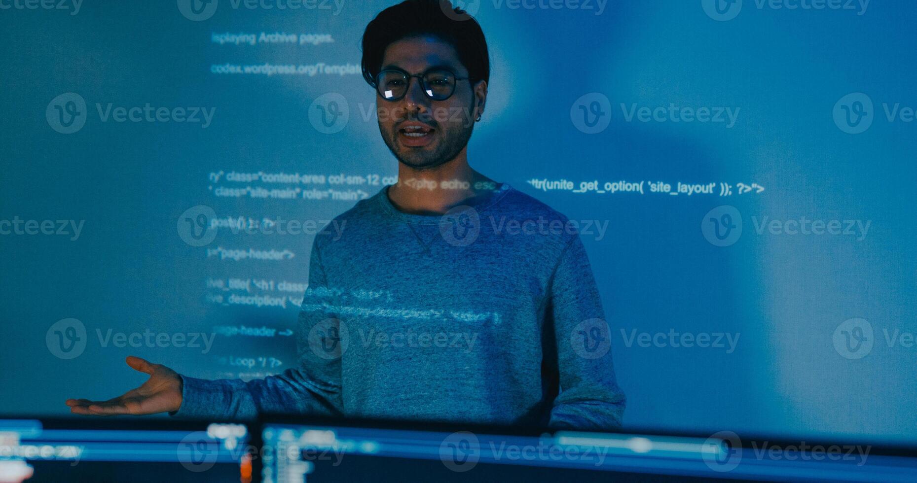 Group adult Asia male software developers mentor leader manager talk strategy plan to executive write prompt AI bot IT app program nomad, game, designer, data center. Projecting slideshow code. photo