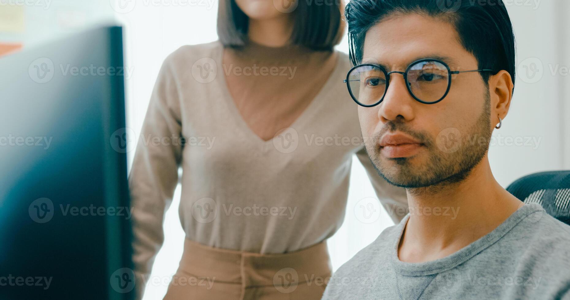 Closeup group Adult Asia male, female freelance meeting write prompt AI bot IT app smart program nomad, game, talk strategy, discuss plan, user interface, data center desktop computer photo