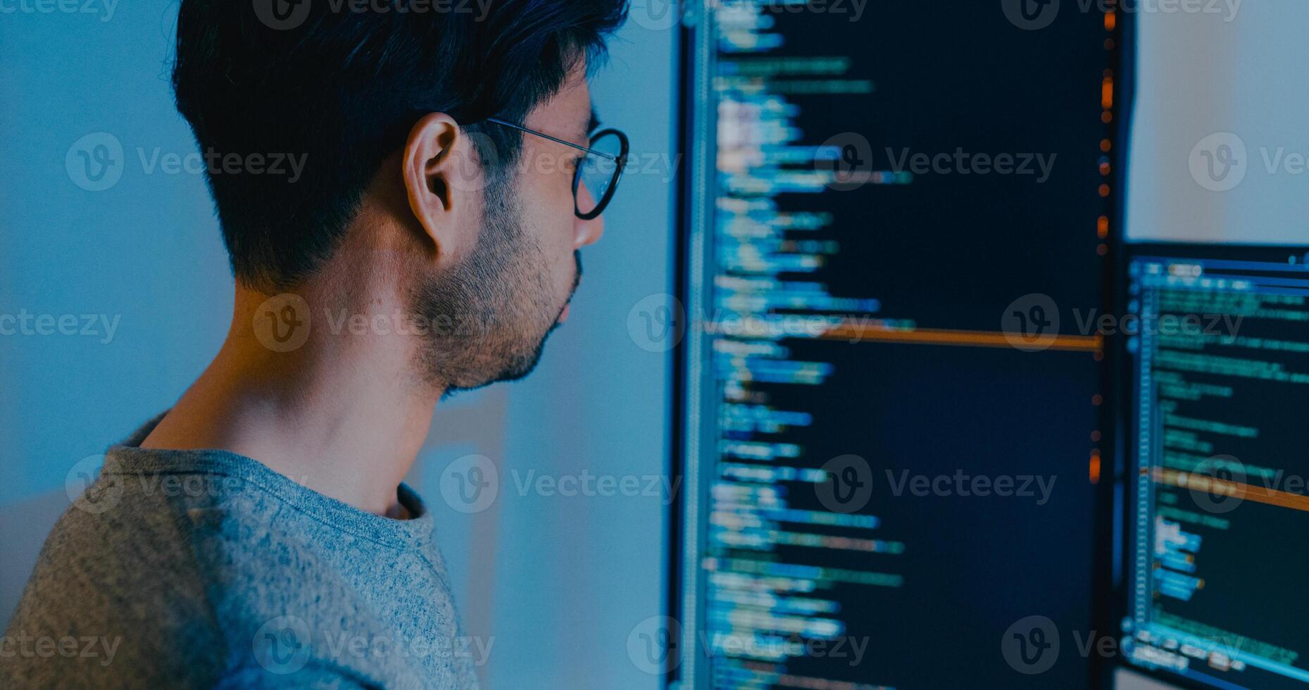 Closeup adult Asia male typing write prompt AI bot IT app smart program nomad, game, terminal with coding language, designer, big data center on desktop computer in night office. photo