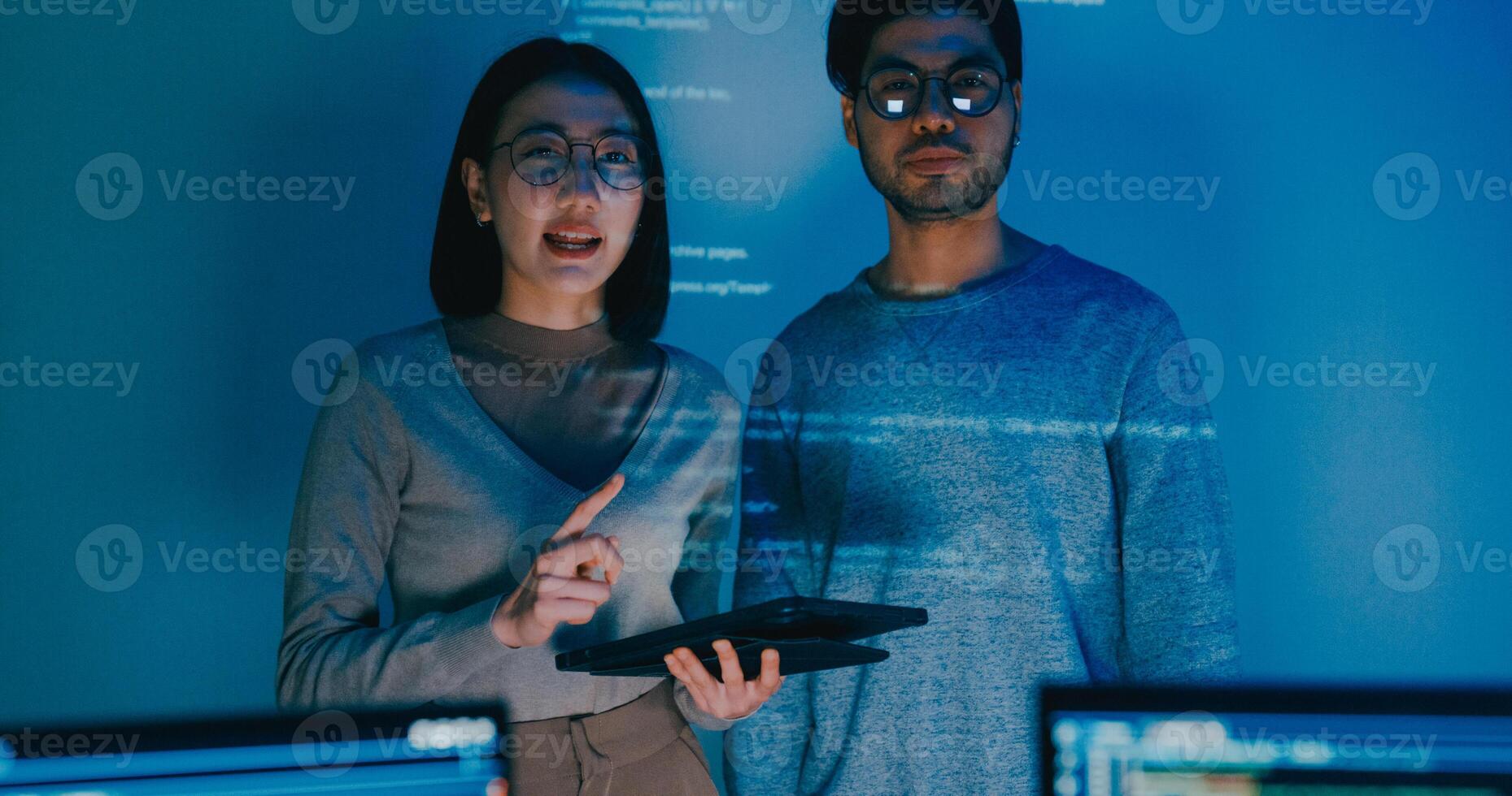 Group adult Asia male female software developers mentor leader manager talk strategy plan to executive write prompt AI bot IT app program nomad, game, data center. Projecting slideshow code photo