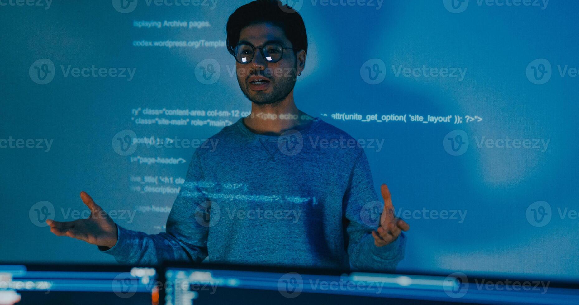 adult Asia male software developers mentor leader manager talk strategy plan to executive write prompt AI bot IT app program nomad, game, designer, data center. Projecting slideshow code. photo