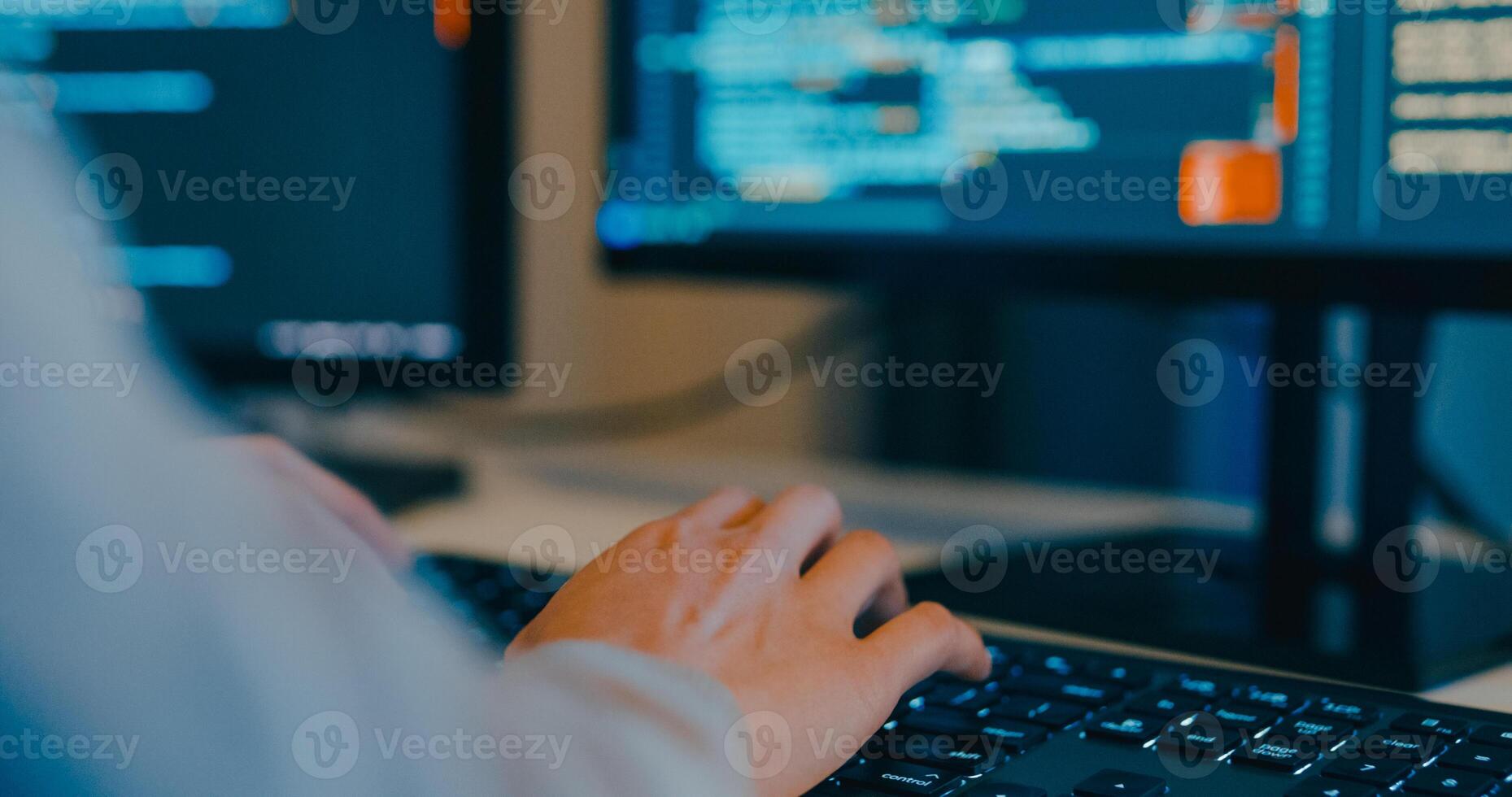 Closeup adult Asia female freelance typing write prompt AI bot IT app program nomad, game, terminal with coding language, designer, big data center on desktop computer in night office. photo